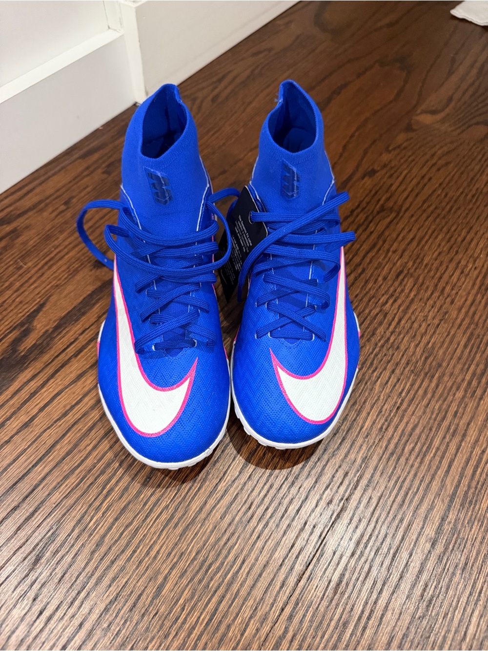 Nike Kids Royal Blue Soccer Cleats with White Swoosh and Pink Trim